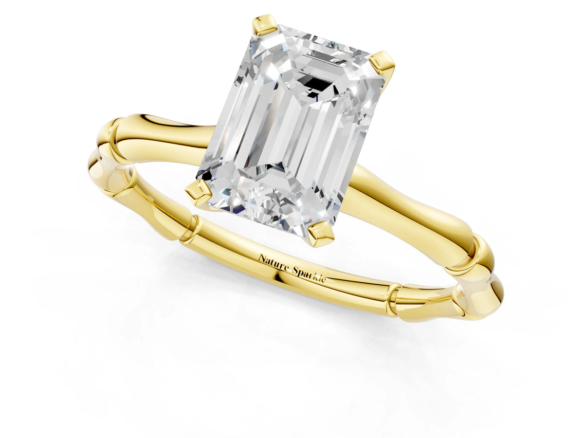 Yellow gold Emerald Cut Solitaire Diamond Ring with Bamboo Band and Four-Prong Setting_1