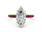 Yellow gold Marquise Cut Diamond Solitaire Ring with Round Garnet Pavé Band and Prong Setting