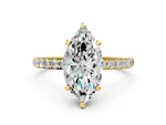 Yellow gold Marquise Cut Diamond Solitaire Ring with Round Moissanite Pavé Band and Prong Setting