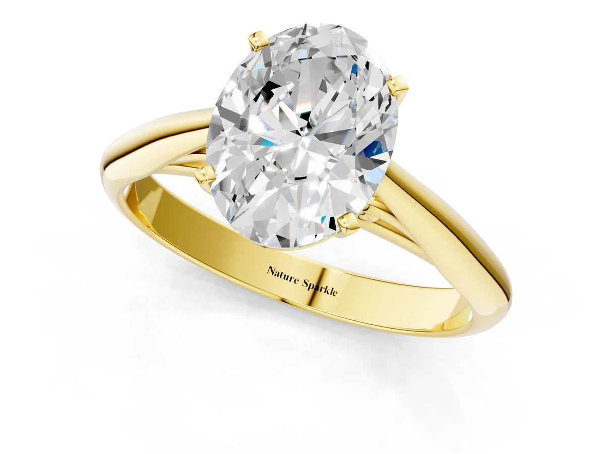 Yellow gold Oval Cut Diamond Solitaire Engagement Ring with Cathedral Setting and Four-Prong Mount_1