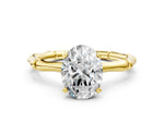 Yellow gold Oval Cut Solitaire Diamond Ring with Bamboo Band and Four-Prong Setting