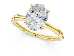 Yellow gold Oval Cut Solitaire Diamond Ring with Bamboo Band and Four-Prong Setting_1