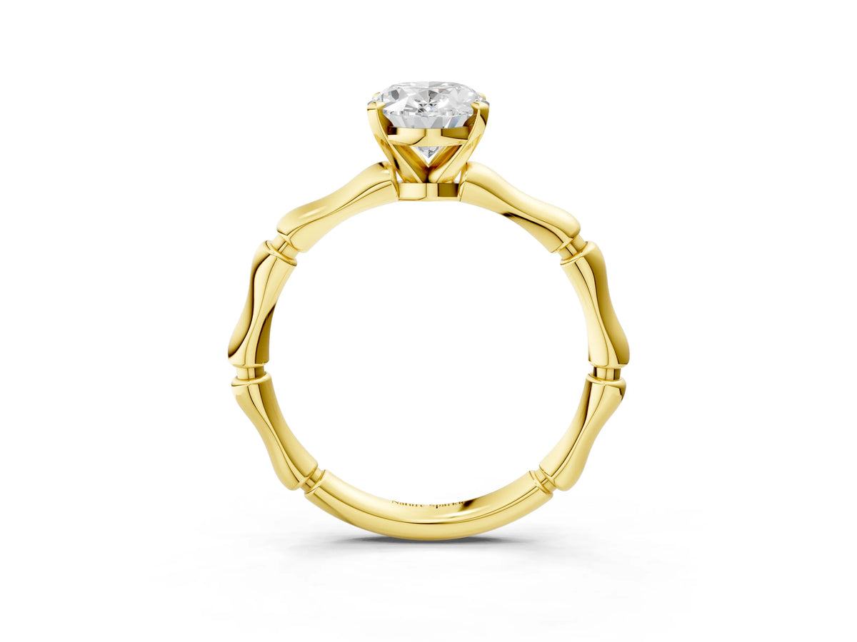 Yellow gold Oval Cut Solitaire Diamond Ring with Bamboo Band and Four-Prong Setting_3