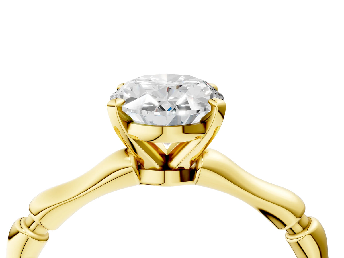 Yellow gold Oval Cut Solitaire Diamond Ring with Bamboo Band and Four-Prong Setting_4