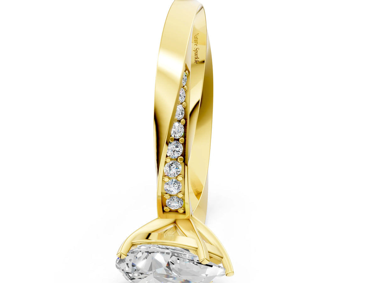 Yellow gold Pear Cut Diamond Engagement Ring with Side Stone Accents and Four-Prong Setting