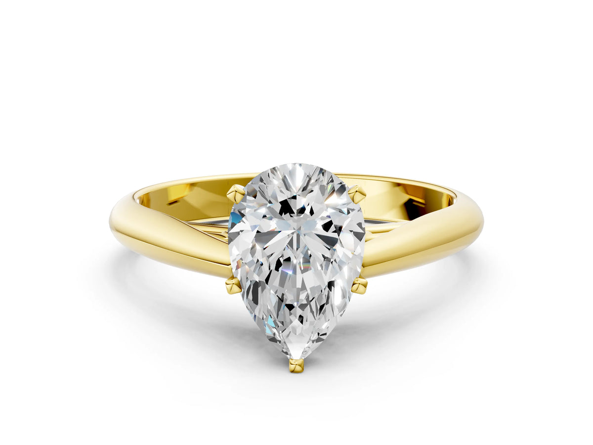 Yellow gold Pear Cut Diamond Solitaire Engagement Ring with Cathedral Setting and Four-Prong Mount