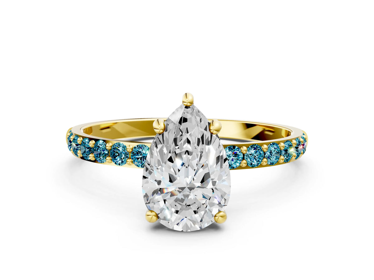 Yellow gold Pear Cut Diamond Solitaire Ring with Round Blue Topaz Pavé Band and Prong Setting