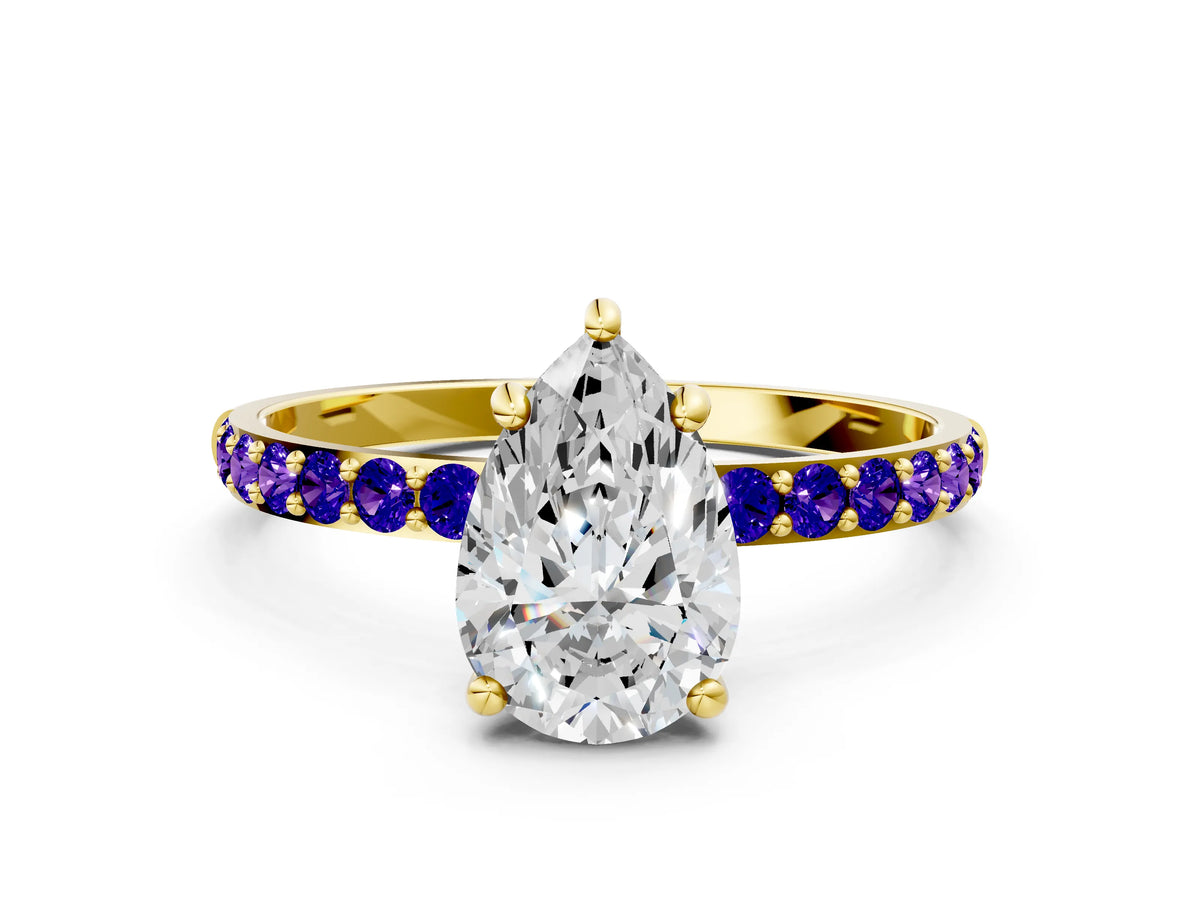 Yellow gold Pear Cut Diamond Solitaire Ring with Round Tanzanite Pavé Band and Prong Setting