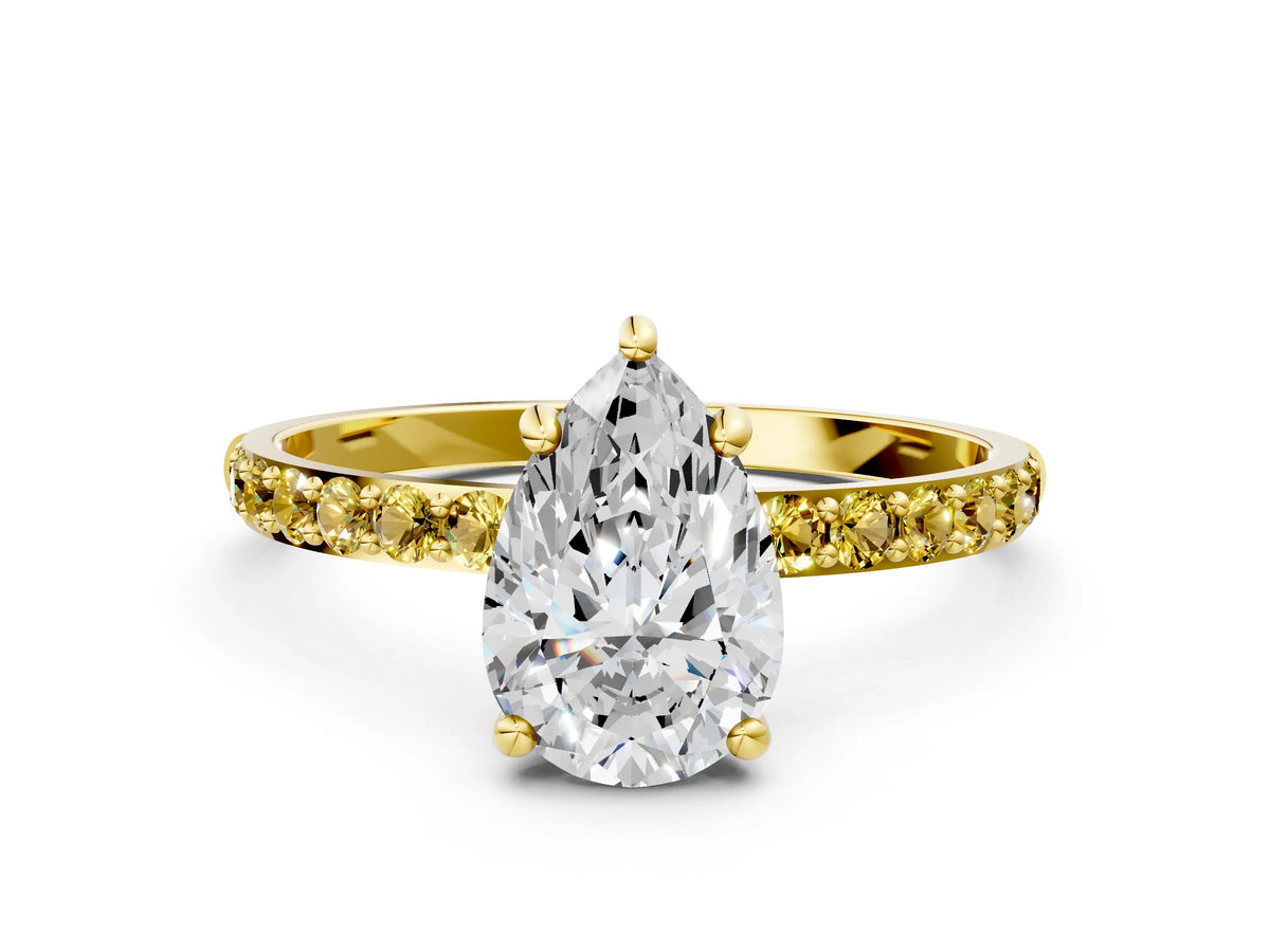 Yellow gold Pear Cut Diamond Solitaire Ring with Round Yellow Sapphire Pavé Band and Prong Setting