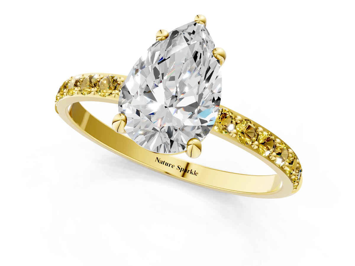 Yellow gold Pear Cut Diamond Solitaire Ring with Round Yellow Sapphire Pavé Band and Prong Setting_1