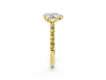 Yellow gold Pear Cut Diamond Solitaire Ring with Round Yellow Sapphire Pavé Band and Prong Setting_2