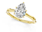 Yellow gold Pear Cut Solitaire Diamond Ring with Bamboo Band and Four-Prong Setting_1