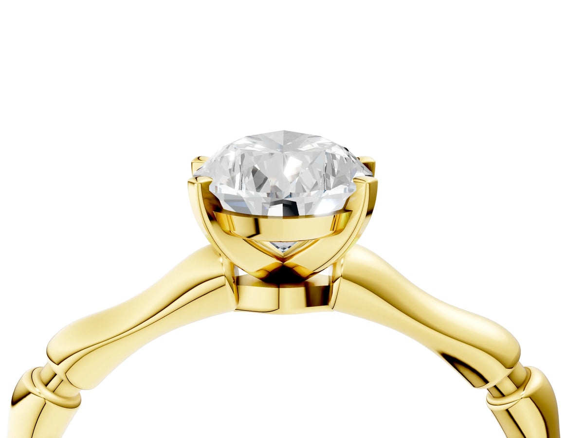 Yellow gold Pear Cut Solitaire Diamond Ring with Bamboo Band and Four-Prong Setting_4