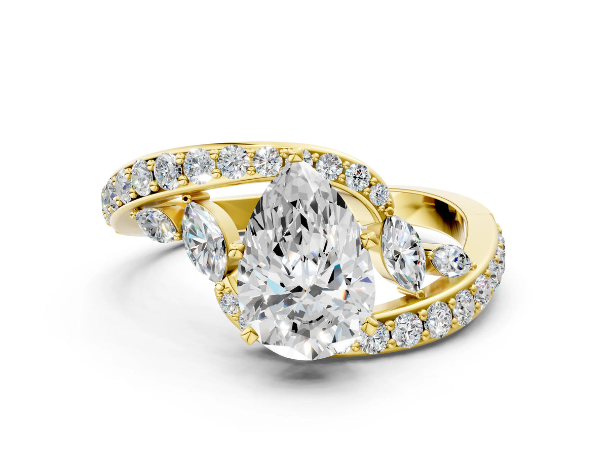 Yellow gold Pear Cut Solitaire with Pavé Twist Band and Four-Prong Setting