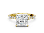 Yellow gold Princess Cut Diamond Solitaire Ring with Round Moissanite Pavé Band and Prong Setting