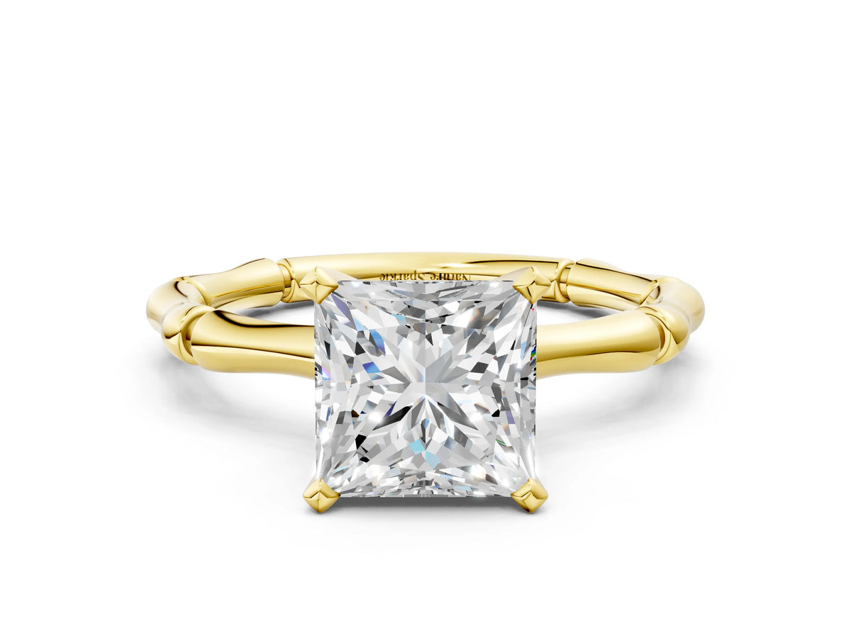 Yellow gold Princess Cut Solitaire Diamond Ring with Bamboo Band and Four-Prong Setting