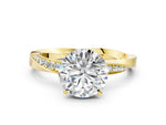 Yellow gold Round Cut Diamond Engagement Ring with Side Stone Accents and Four-Prong Setting