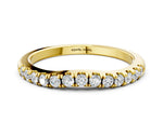 Yellow gold Round Diamond Pavé Curved Eternity Band with Shared Prong Setting