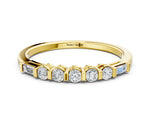 Yellow gold Round and Baguette Diamond Prong Set Half-Eternity Band