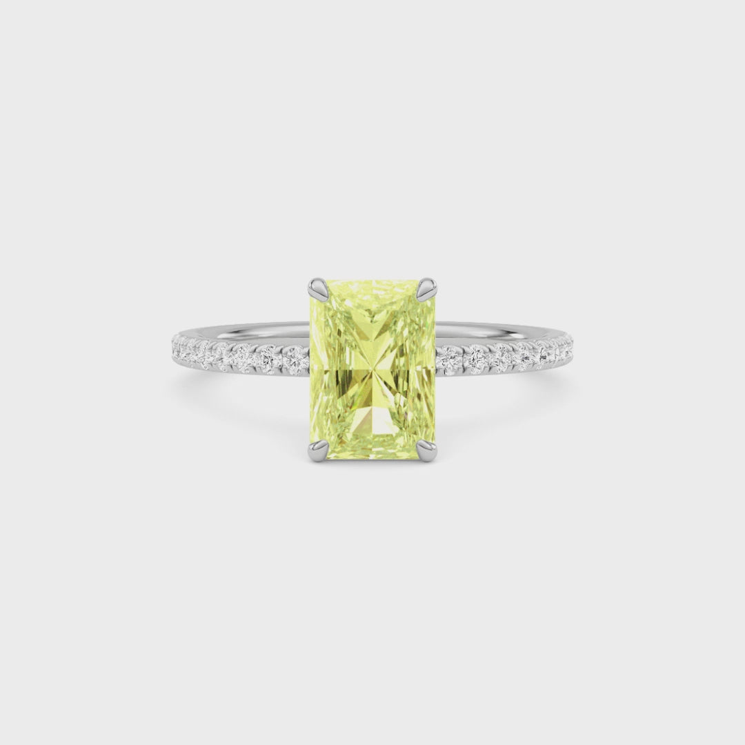 Yellow gold Fancy Yellow Radiant Cut Diamond Solitaire with Pavé Band