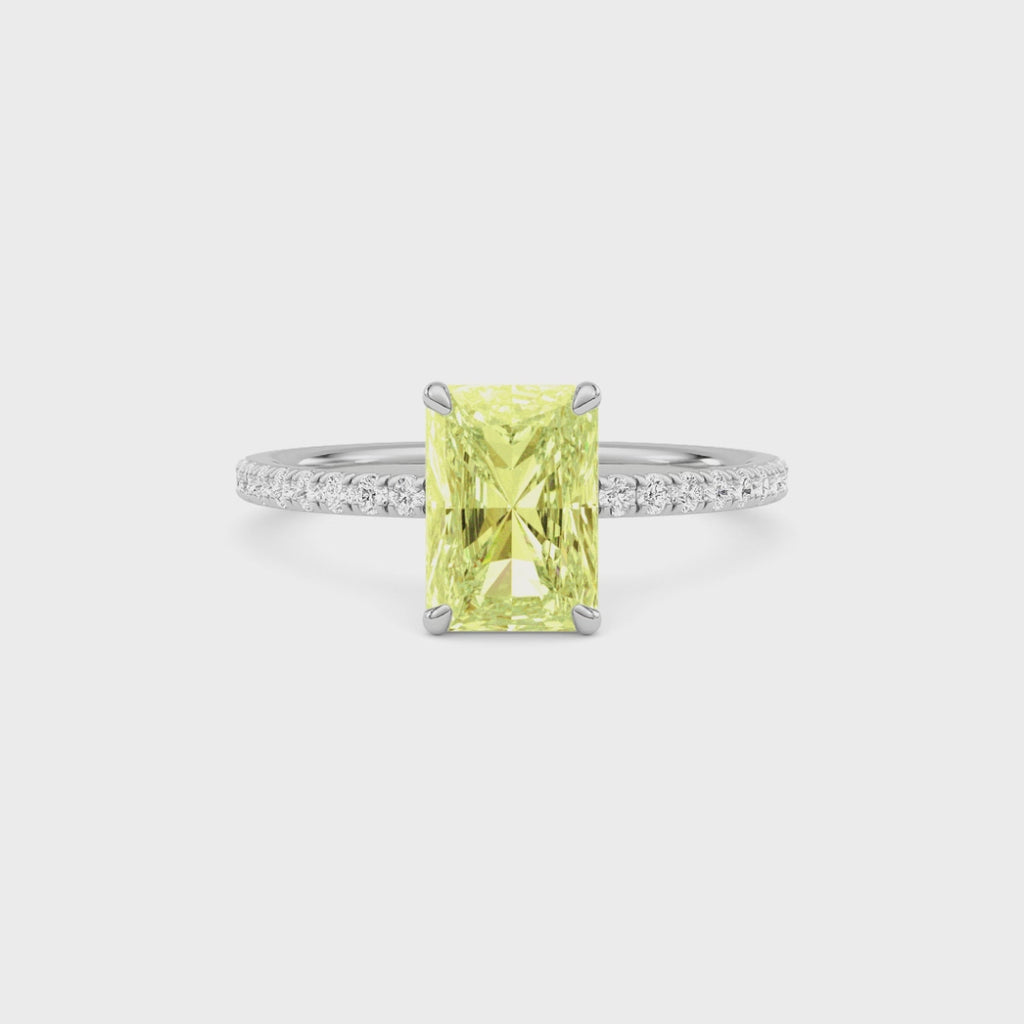 Yellow gold Fancy Yellow Radiant Cut Diamond Solitaire with Pavé Band