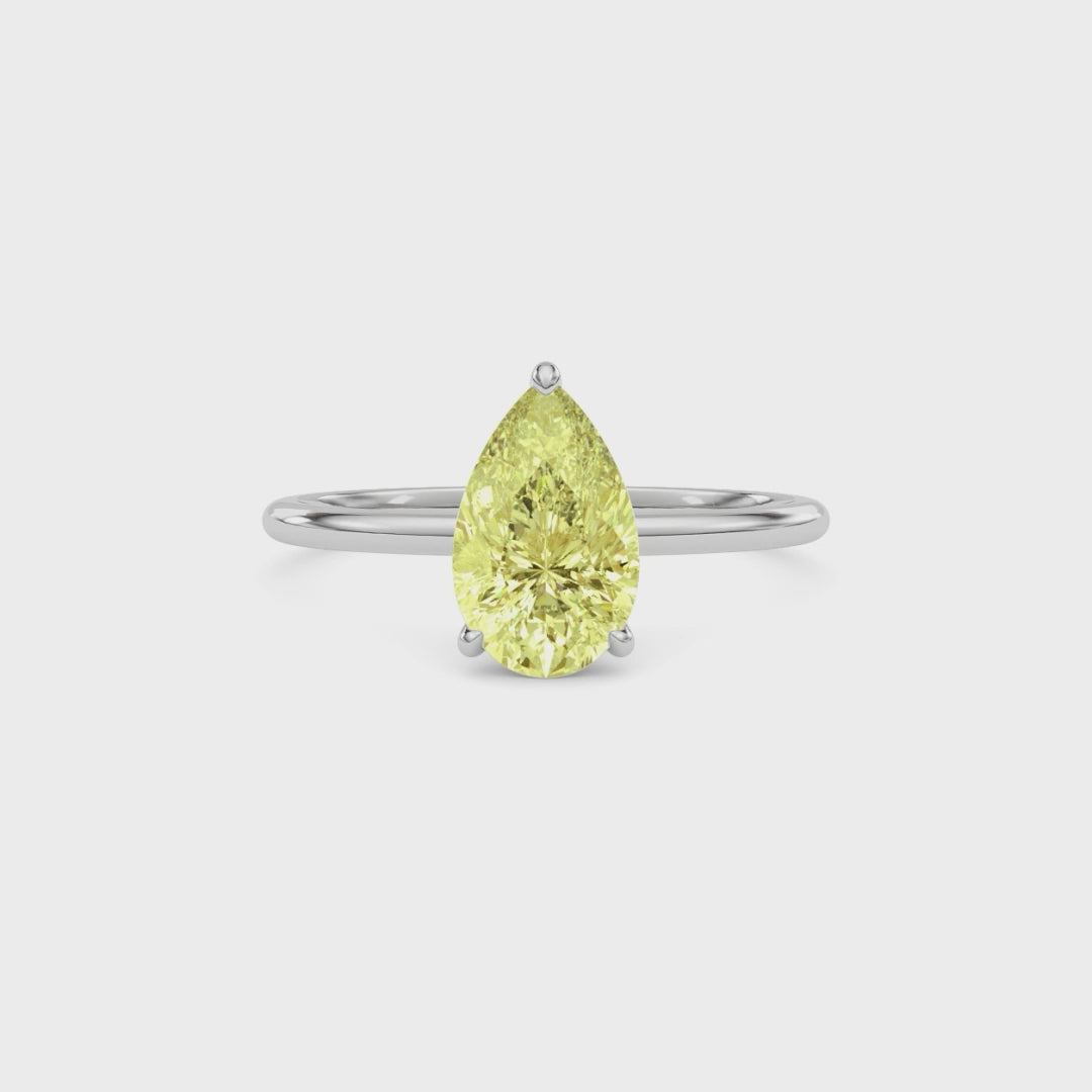 Yellow gold Fancy Yellow Pear Cut Diamond Hidden Halo Solitaire Engagement Ring with Prong Setting