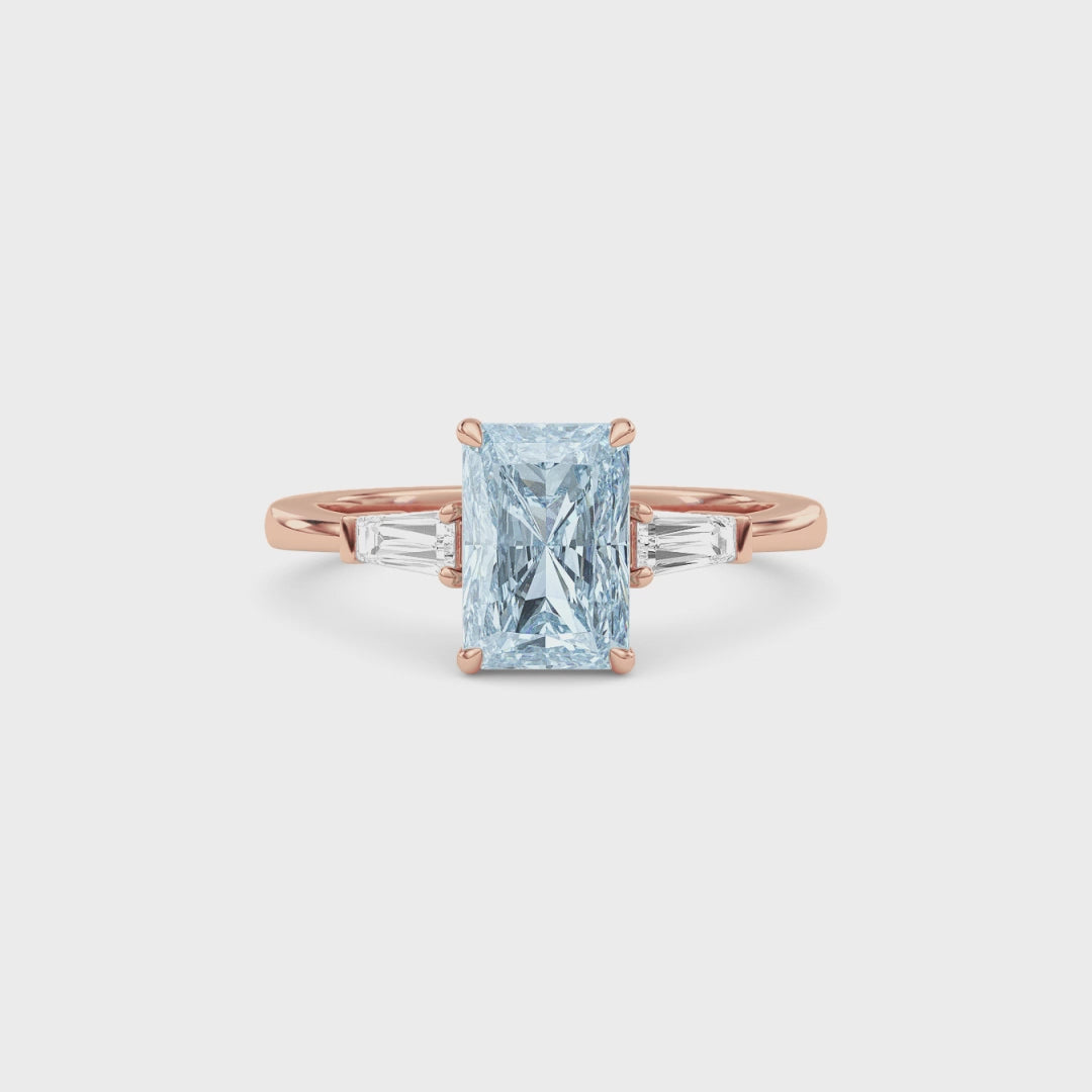 Rose gold Three-Stone Fancy Blue Radiant Cut Diamond Ring with Tapered Baguette Side Stones
