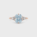 Rose gold Fancy Blue Cushion Cut Three Stone Diamond Engagement Ring with Tapered Baguette and Round Side Stones