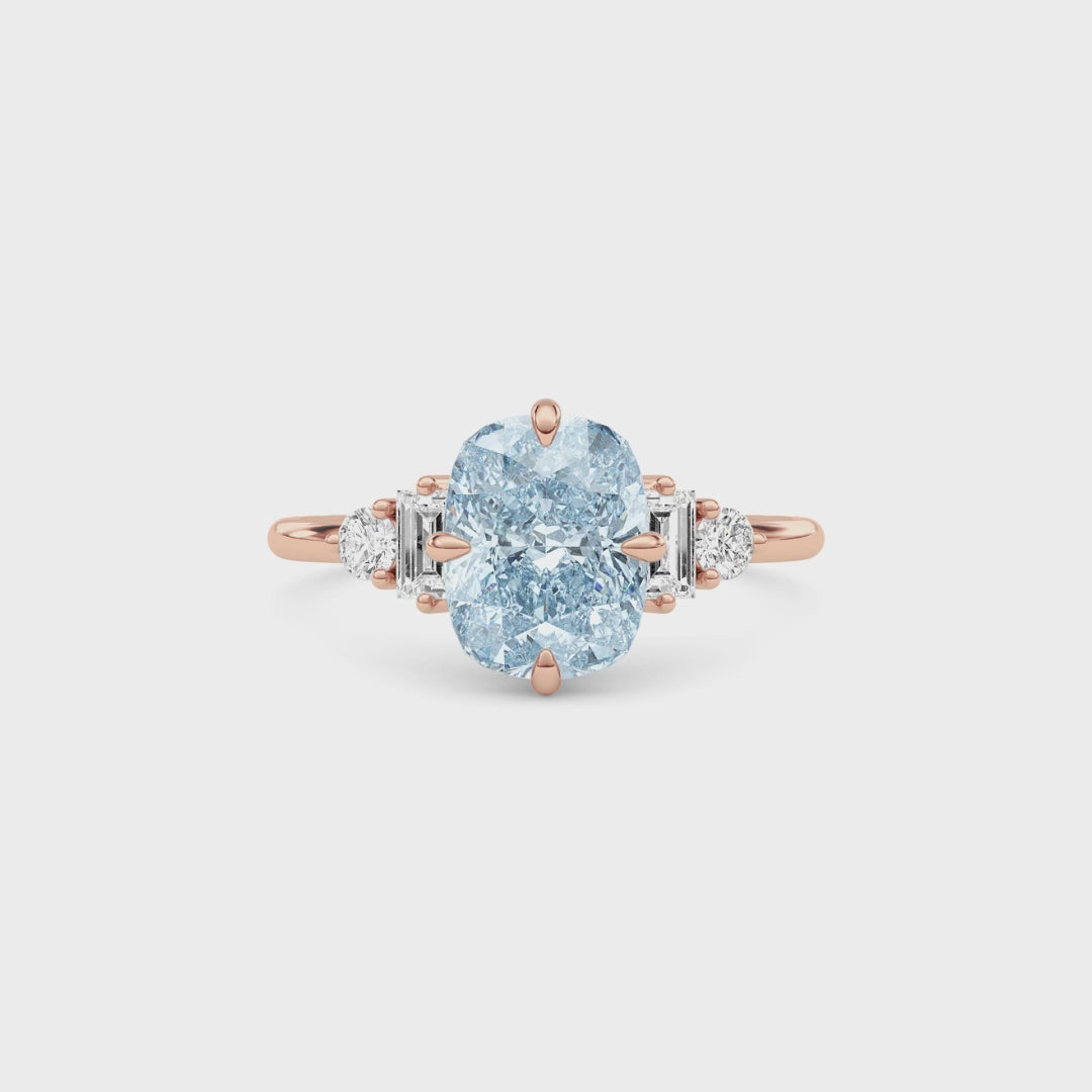 Rose gold Fancy Blue Cushion Cut Three Stone Diamond Engagement Ring with Tapered Baguette and Round Side Stones