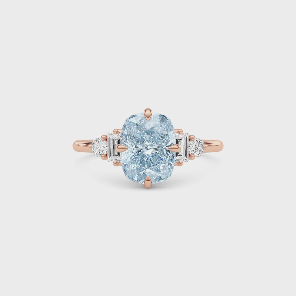 Rose gold Fancy Blue Cushion Cut Three Stone Diamond Engagement Ring with Tapered Baguette and Round Side Stones
