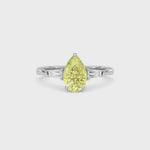 Yellow gold Three-Stone Fancy Yellow Pear Cut Diamond Ring with Tapered Baguette Side Stones