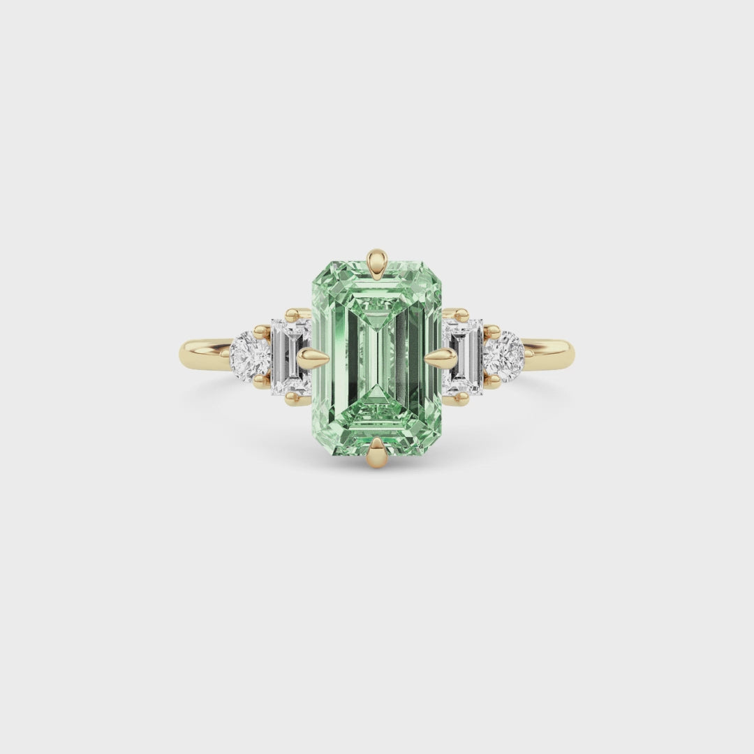 Yellow gold Three-Stone Fancy Green Emerald Cut Diamond Ring with Heart Side Stones