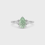Silver Three-Stone Fancy Green Pear Cut Diamond Ring with Trillion Side Stones