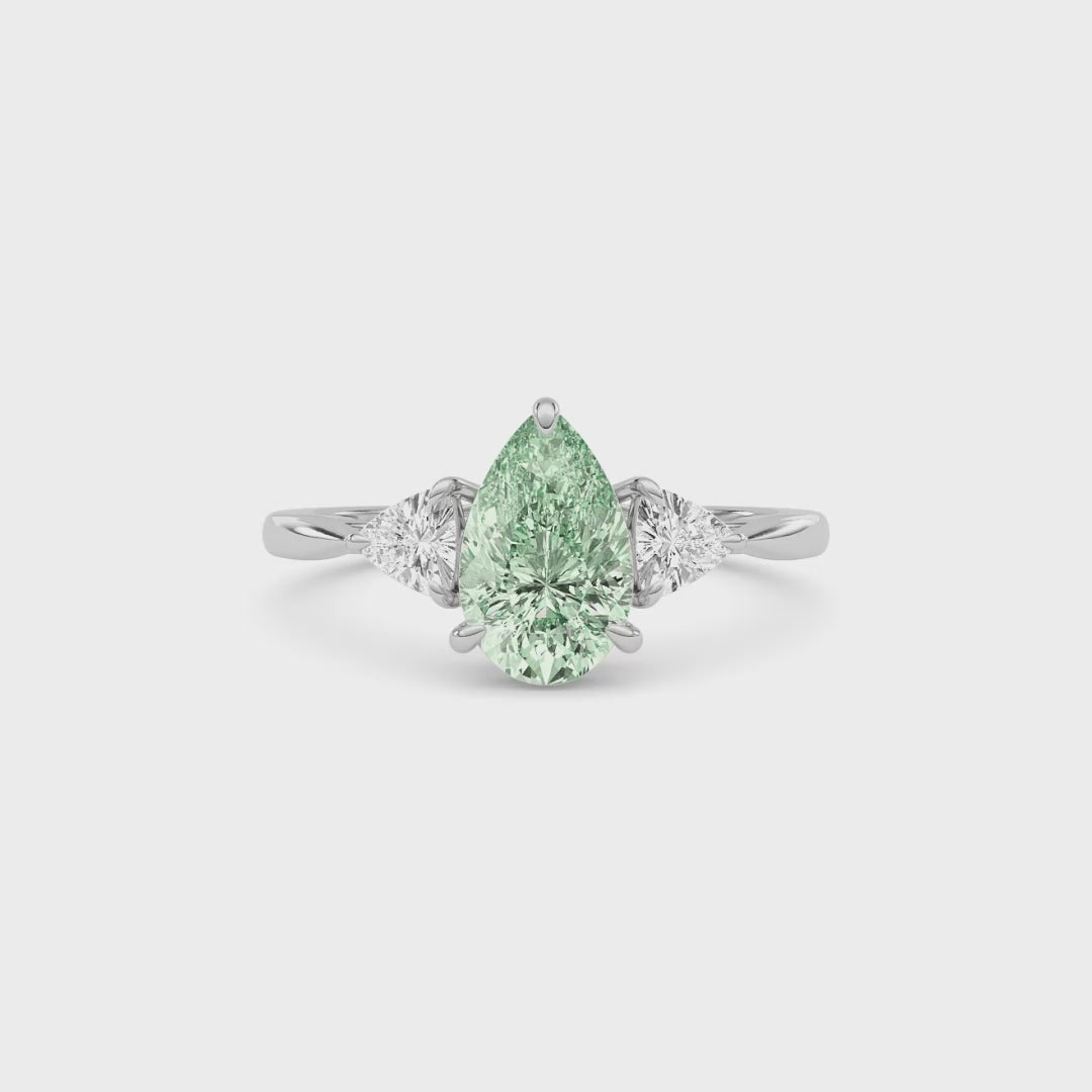 Silver Three-Stone Fancy Green Pear Cut Diamond Ring with Trillion Side Stones