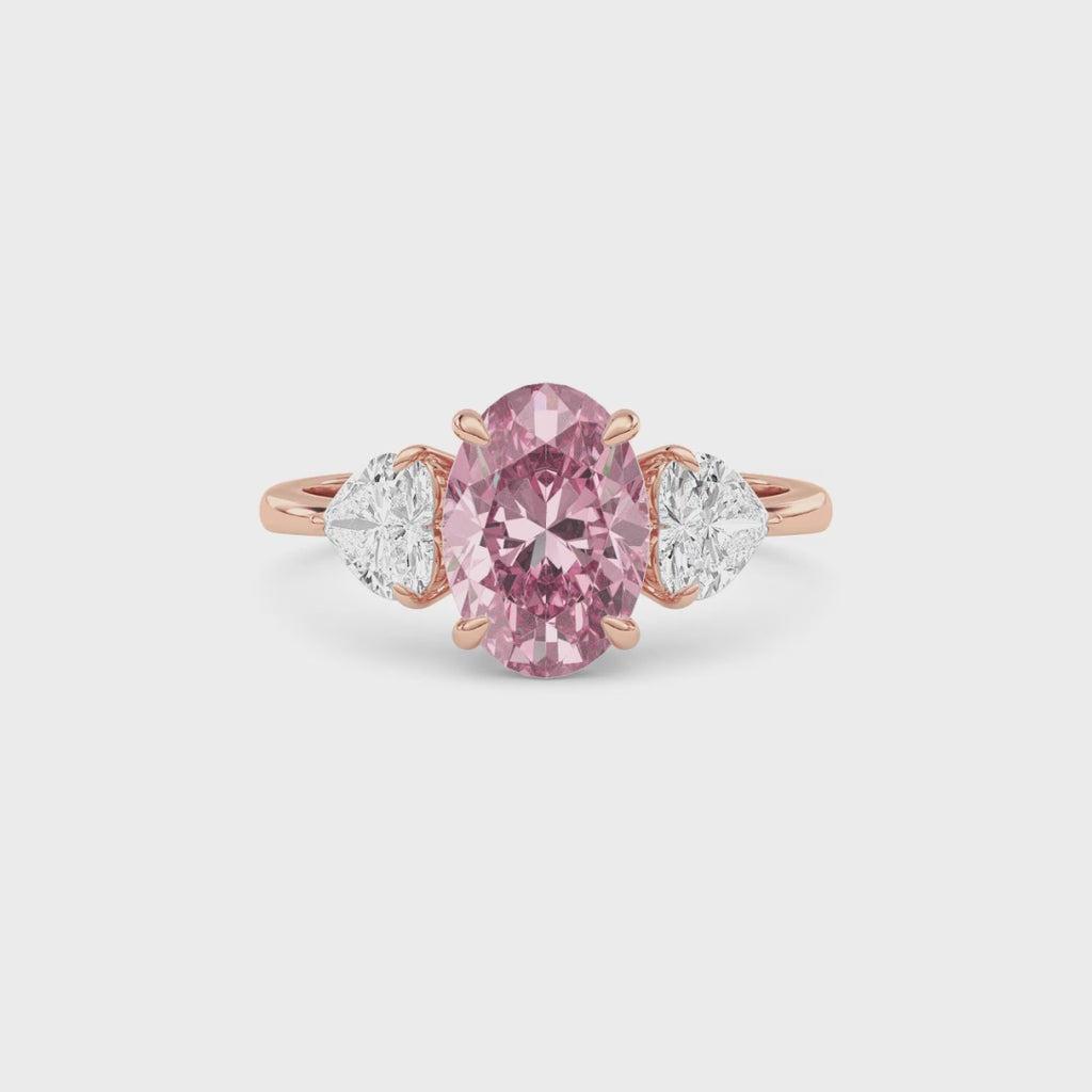 Rose gold Three-Stone Fancy Pink Oval Cut Diamond Ring with Heart Side Stones