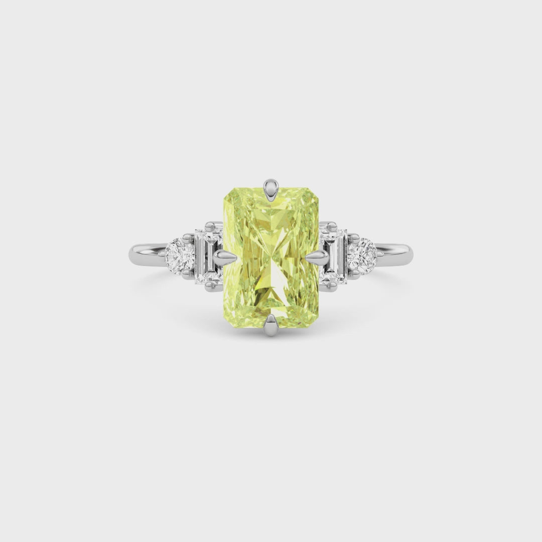 Yellow gold Three-Stone Fancy Yellow Radiant Cut Diamond Ring with Heart Side Stones