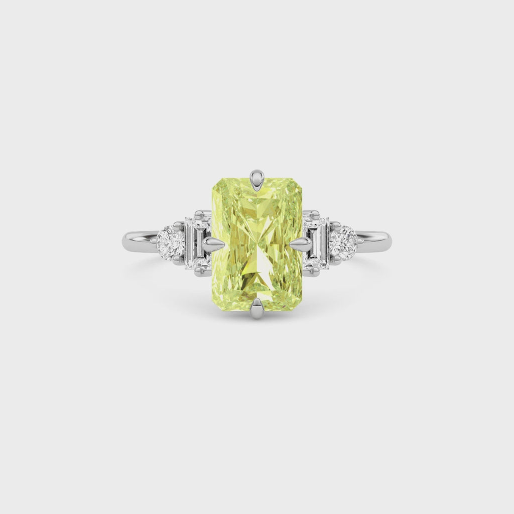 Yellow gold Three-Stone Fancy Yellow Radiant Cut Diamond Ring with Heart Side Stones