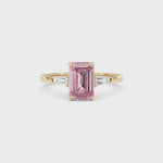 Yellow gold Three-Stone Fancy Pink Emerald Cut Diamond Ring with Tapered Baguette Side Stones