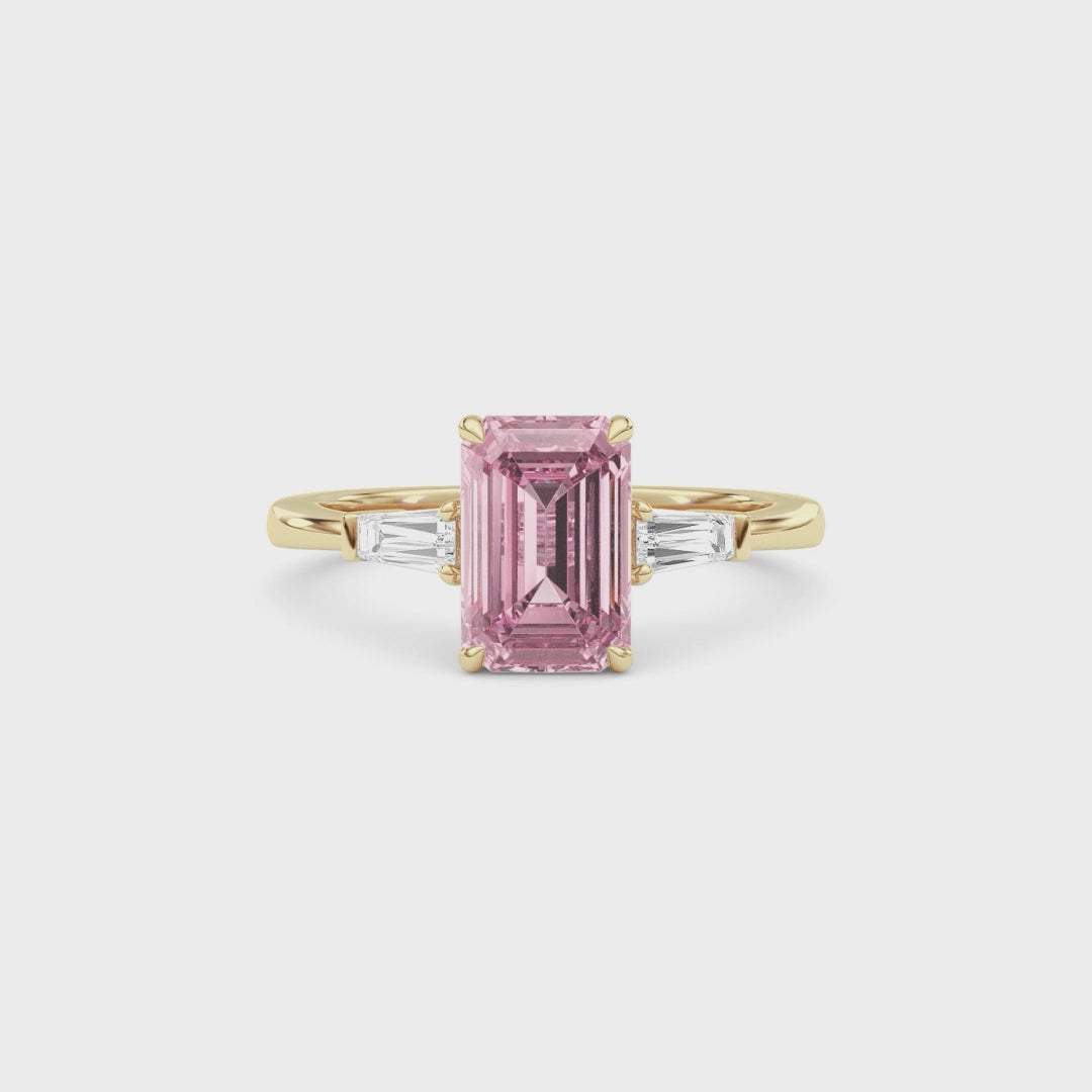Yellow gold Three-Stone Fancy Pink Emerald Cut Diamond Ring with Tapered Baguette Side Stones