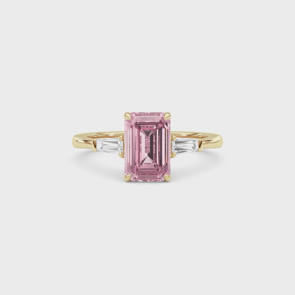 Yellow gold Three-Stone Fancy Pink Emerald Cut Diamond Ring with Tapered Baguette Side Stones