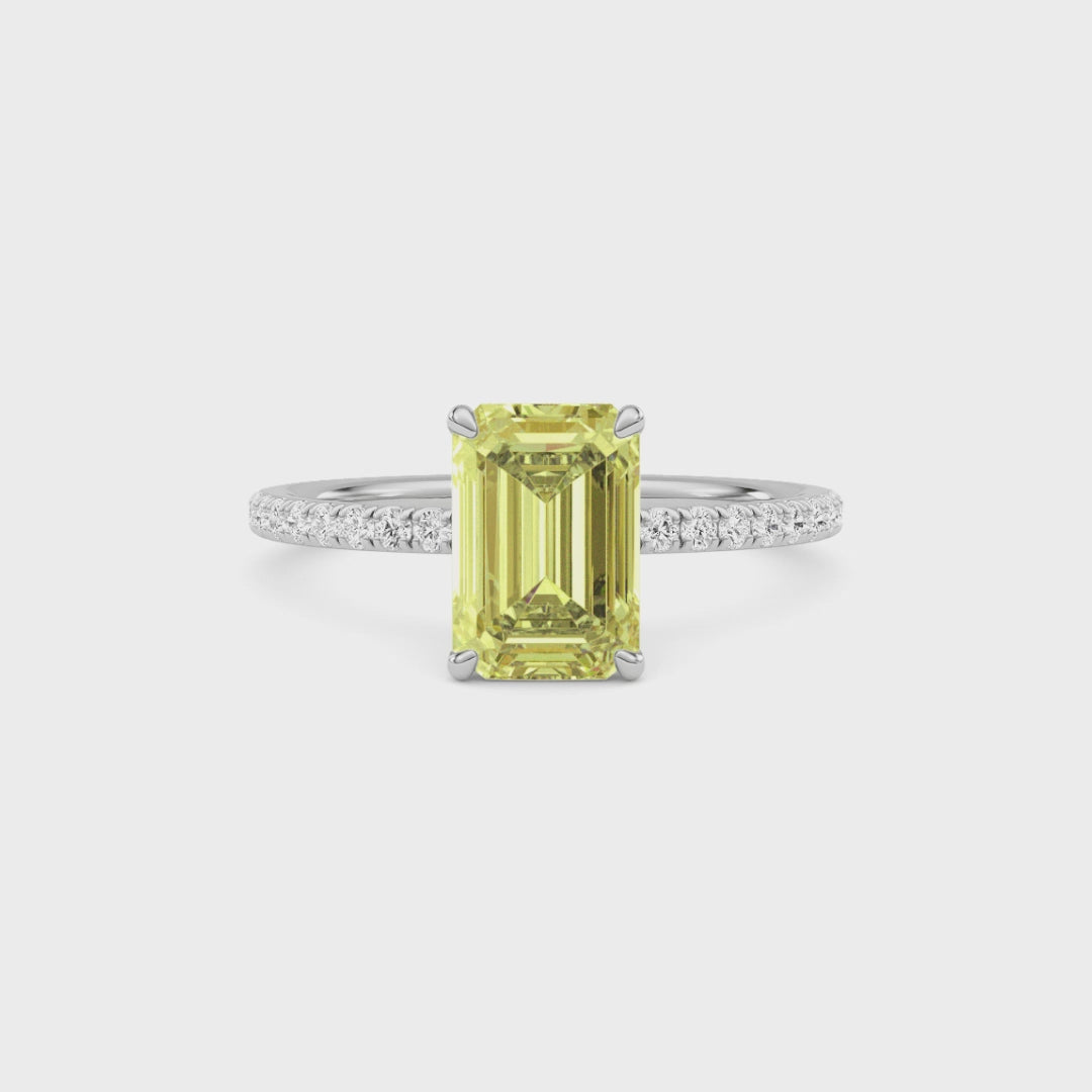 Yellow gold Fancy Yellow Emerald Cut Diamond Solitaire with Pavé Band