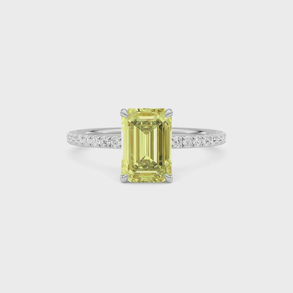 Yellow gold Fancy Yellow Emerald Cut Diamond Solitaire with Pavé Band
