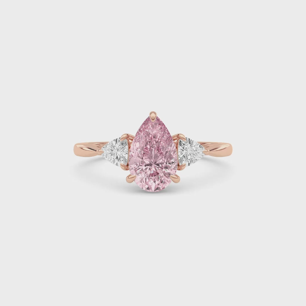 Rose gold Three-Stone Fancy Pink Pear Cut Diamond Ring with Trillion Side Stones