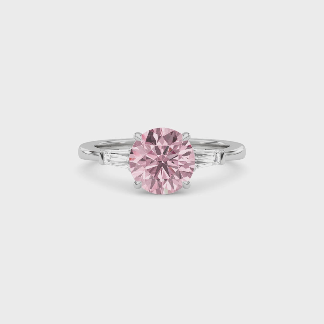 Silver Three-Stone Fancy Pink Round Cut Diamond Ring with Tapered Baguette Side Stones