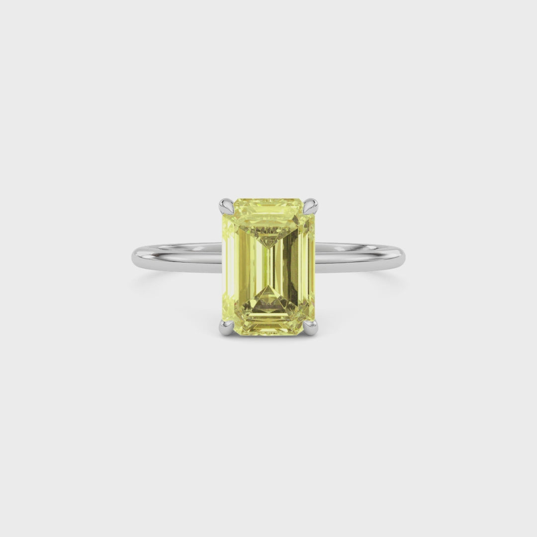 Yellow gold Fancy Yellow Emerald Cut Diamond Hidden Halo Solitaire Engagement Ring with Prong Setting