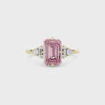 Yellow gold Fancy Pink Emerald Cut Three Stone Diamond Engagement Ring with Tapered Baguette and Round Side Stones