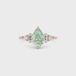 Rose gold Fancy Green Pear Cut Three Stone Diamond Engagement Ring with Tapered Baguette and Round Side Stones