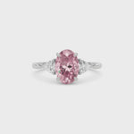 White gold Three-Stone Fancy Pink Oval Cut Diamond Ring with Trillion Side Stones