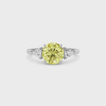 Yellow gold Three-Stone Fancy Yellow Round Cut Diamond Ring with Trillion Side Stones