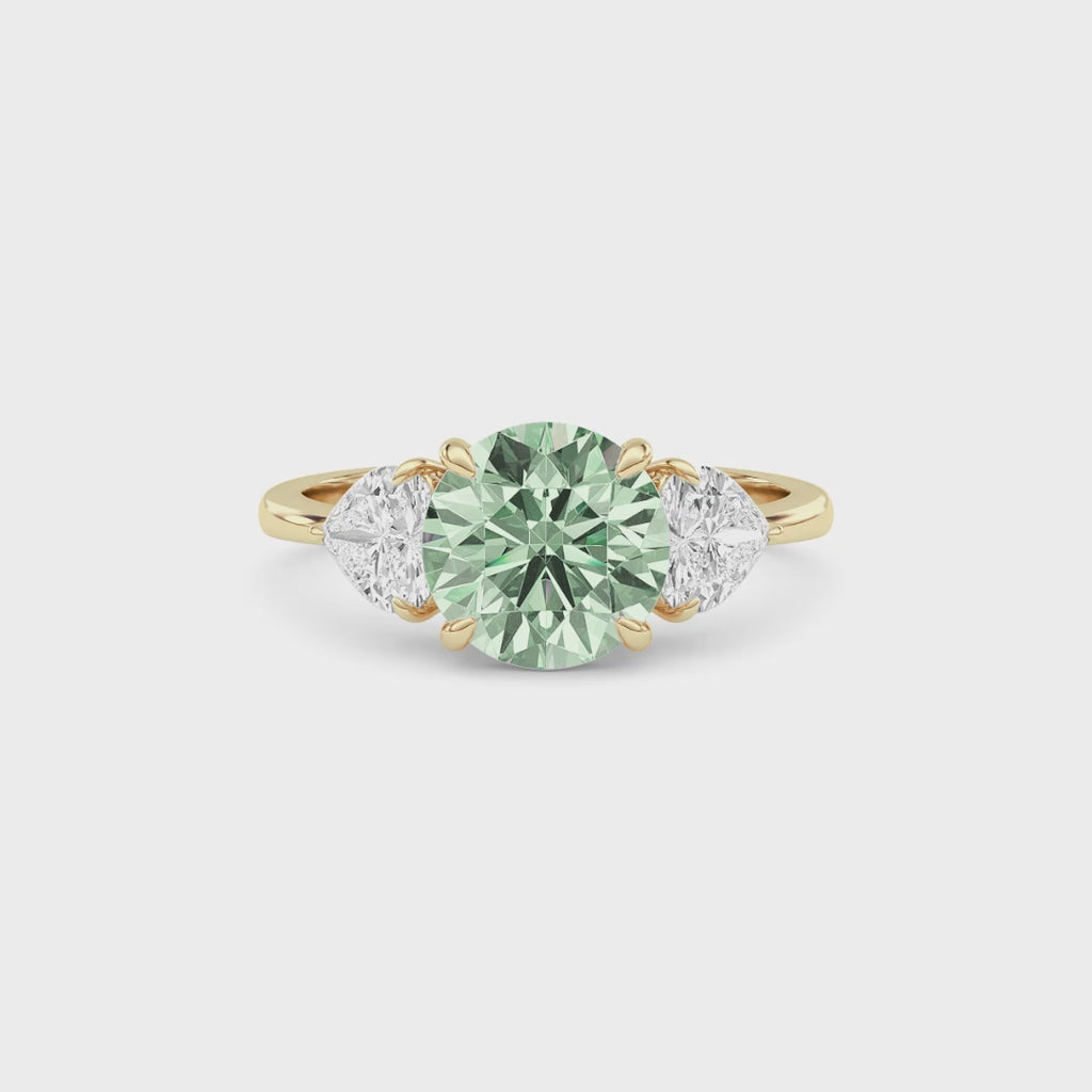 Yellow gold Three-Stone Fancy Green Round Cut Diamond Ring with Heart Side Stones